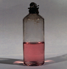 Photo, bottle of colloidal "ruby" gold solution