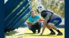 Football player and coach at practice