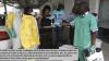 health work sprays person in full body protective gear